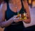 li-woman-holding-tea-night.webp